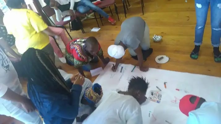 KKQH Members working on a drawing